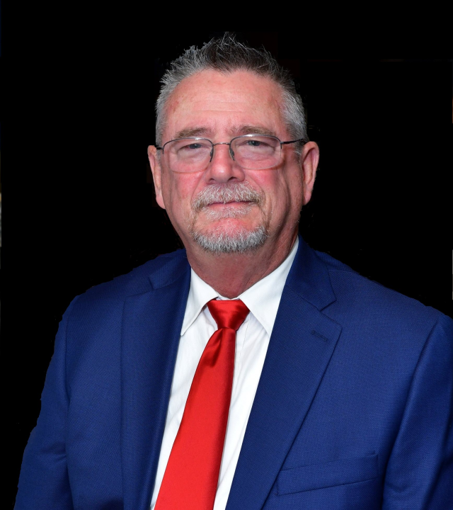 rick in blue suit 1.webp